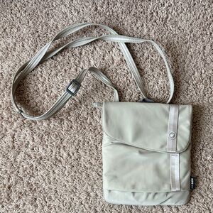 Pacsafe Cream Crossbody Bag